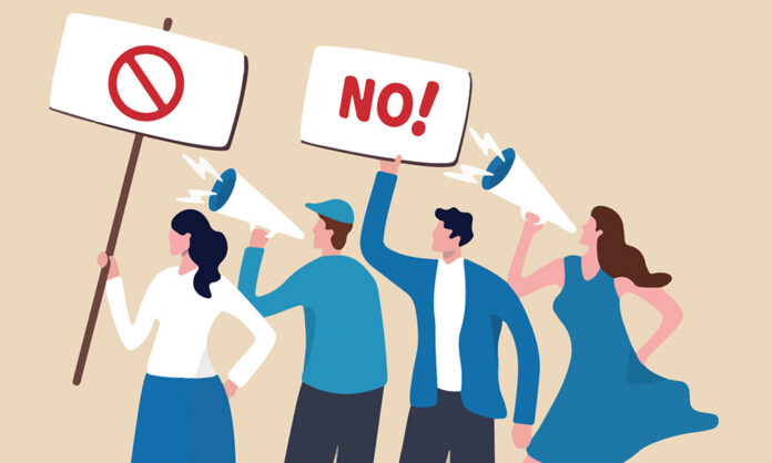 Abstract illustration of four protesters - two men, two women - holding bullhorns and signs that say 