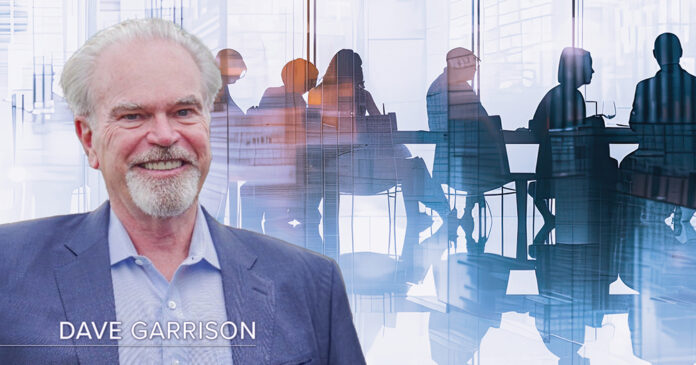 Dave Garrison's headshot over an abstracted graphic of a board meeting